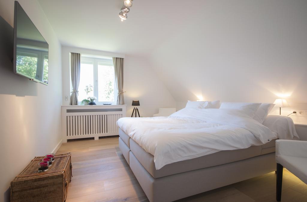 B&B Patrijzenhoek Кноке-Хайст Стая снимка